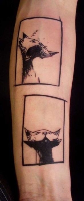 Tatuaje de un gato bostezando por Karl Marc.